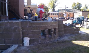 Masonry contractor repairing stairs in Buffalo, NY